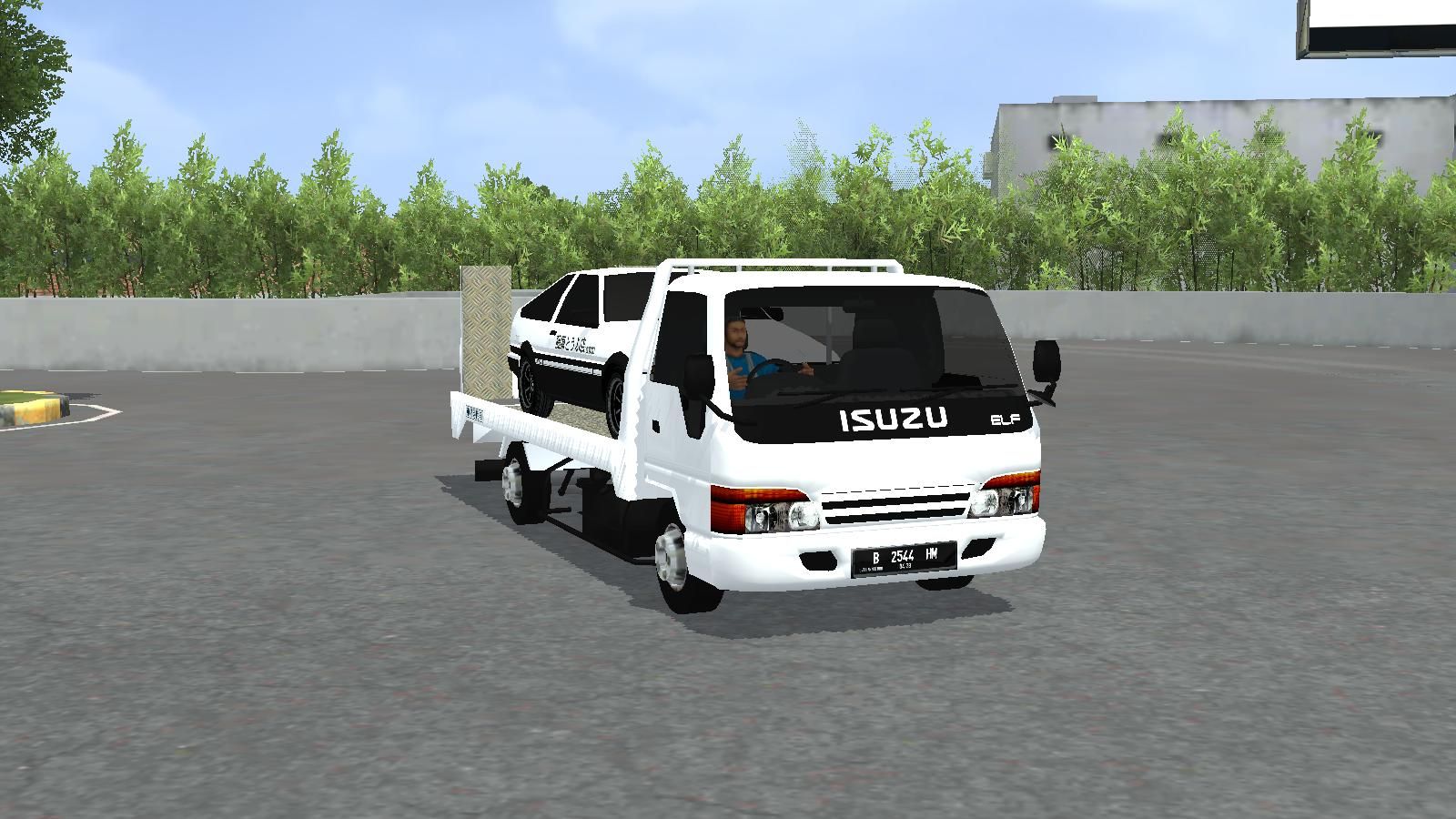 Photo of Isuzu Elf Safety Loader Truck (Towing) 2