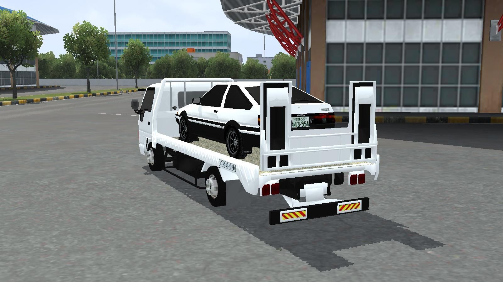 Photo of Isuzu Elf Safety Loader Truck (Towing) 7